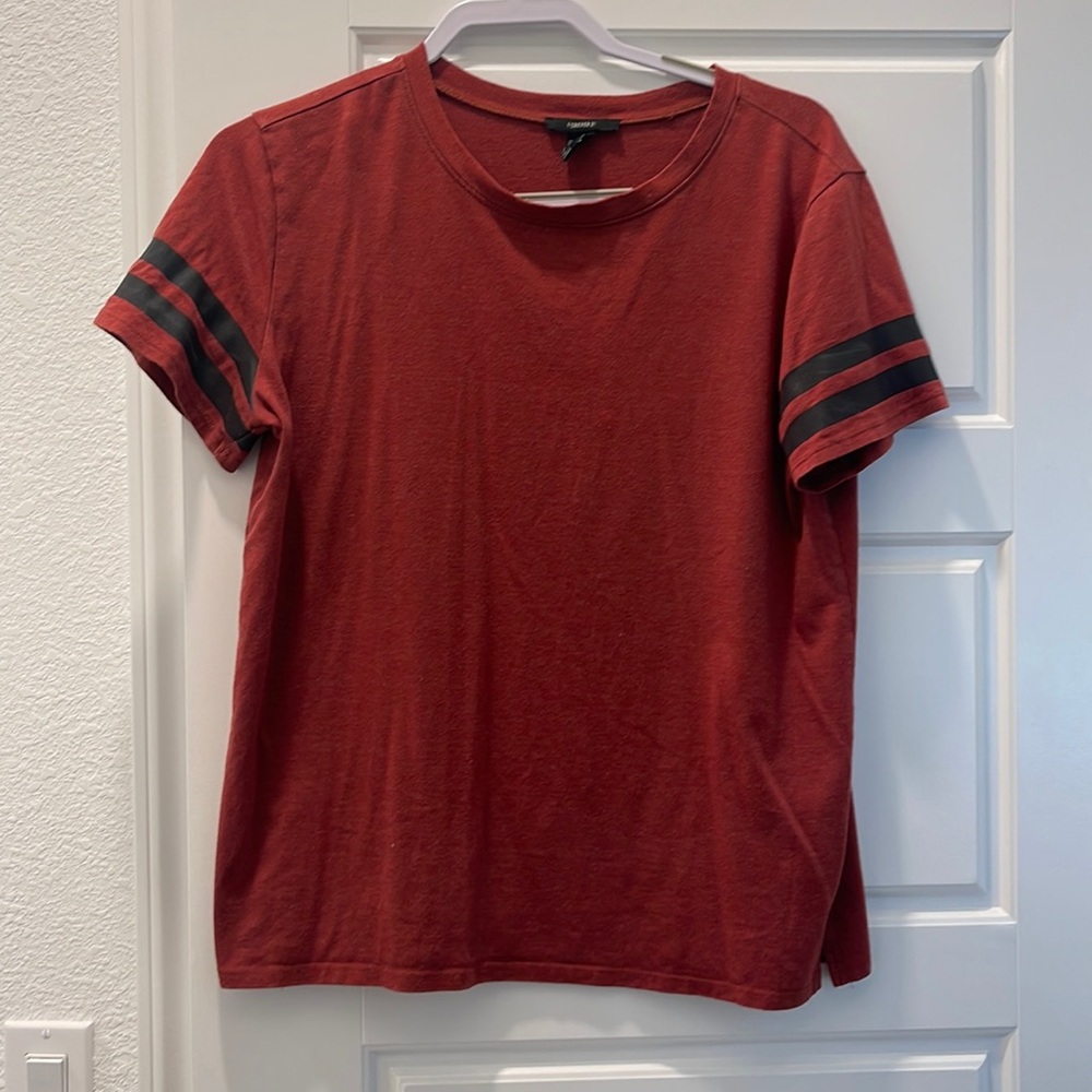 Orangey too with black stripes at the arm